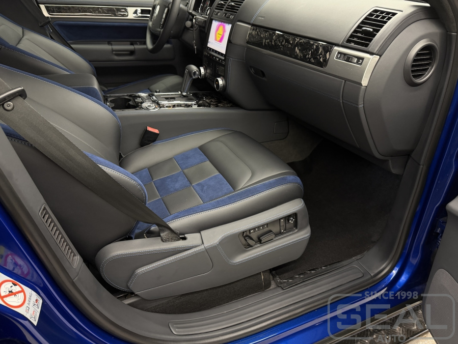 Салон Volkswagen Touareg I после перетяжки боковых панелей передних сидений