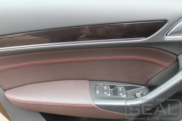 Audi Q3 Перетяжка подлокотников и дверных вставок