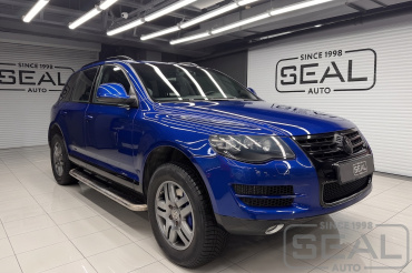 Volkswagen Touareg Перетяжка торпедо и панелей