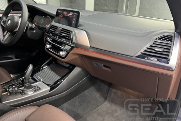 Перетяжка торпедо в автомобиле BMW X3