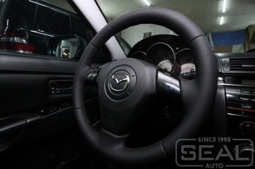 Mazda 3 (BK) Перетяжка руля
