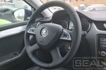 Skoda Octavia Перетяжка руля и пошив чехлов для ркучек